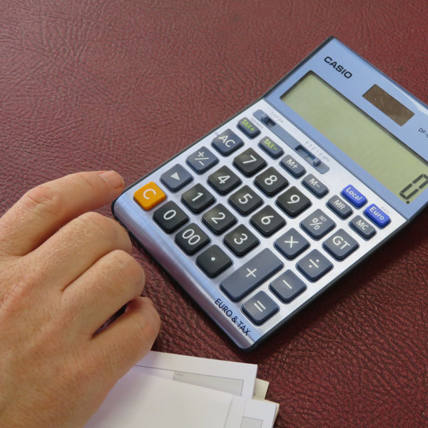 Calculator being used by accountant
